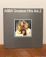 Front cover of ABBA Greatest Hits Vol. 2 album showing photo of band members and title text.