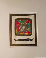 Front view of the original artwork showing vibrant colours, black patterned border, handwritten title and signature.