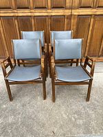 Front view of four chairs arranged in two rows