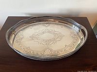 Top view showing engraved center design and pierced gallery edge