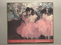 Frontal view of the framed Degas dancers poster showing colorful ballerinas in pink tutus and the Hill-Stead Museum label.