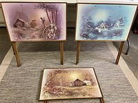 Front view of all three folding TV tray tables showing colorful barn-themed artwork and wooden legs