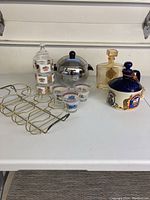 Full view of entire barware set on white surface showing all items