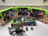 Three boxed Power Rangers Lightning Collection figures with TMNT crossover on display in original packaging