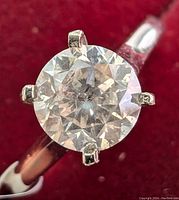 Close-up top view of the round brilliant diamond in six-prong setting