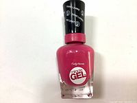 Clear image of one bottle of Sally Hansen Miracle Gel Nail Polish. The bottle is pink colored with black cap labeled Miracle Gel.
