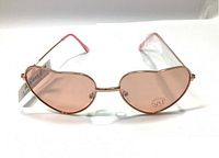 Front view of pink heart-shaped sunglasses with pink tinted lenses and thin metal frame