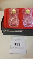 Two crystal vases in original box labeled 'Cristal d'Arques France' with auction lot tag