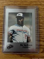 Front of Bo Jackson Memphis Chicks baseball card showing player in uniform, name, position, and team logo.