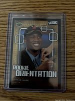 Front of the Dwyane Wade rookie basketball card from Upper Deck Victory series showing Rookie Orientation label and player image in Miami Heat cap.