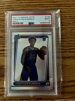 Front of the 2021 Donruss Optic Jonathan Kuminga rookie card showing player image, card details, and PSA grading label indicating Mint 9 condition.