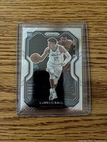 Front view of the LaMelo Ball rookie card showing player image and Prizm logo.