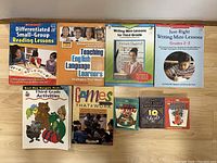 Photo showing the front covers of nine educational resource books related to reading, writing, and third grade activities.