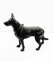 Left side profile of standing German Shepherd door stop showing dog’s posture and condition.