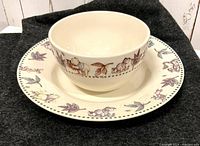 Top-down and side view of the matching plate and bowl set showing character illustrations and leaf design around the rims