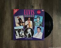 Front cover of Elvis Presley Images 2LP vinyl record, showing colorful images of Elvis and indication of 2 record set import edition.
