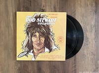 Photo showing the front of 'The Rod Stewart Collection' 2LP vinyl record set with two black vinyl records.
