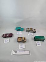 Overview of five 1960s vintage diecast vehicles, each labeled with its approximate year and brand.