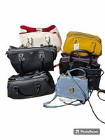 Group photo showing seven different purses in various colors and styles including black, white, yellow, blue, maroon, and red lining