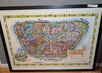 Overall view of framed Disneyland map on wall