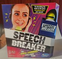 Front of the Speech Breaker game box showing title and graphics of a woman using the headset with text describing the voice-jamming challenge.