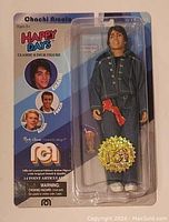 Front view of the Mego Happy Days Chachi Arcola 8-inch figure in blister packaging showing character in blue jacket, red accessory, and limited edition gold foil sticker