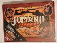 Front side of sealed Jumanji board game box with jungle themed artwork and French text
