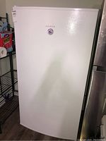 Front view of closed freezer showing full unit