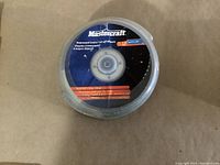 Photo of packaged 12-pack Mastercraft cut-off wheels showing label with brand and size.