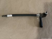 Flexible angled magnetic bit driver tool showing overall shaft and handle.