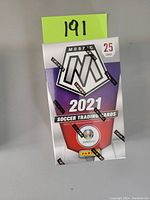Front view of sealed 2021 Panini Mosaic Soccer trading card box showing branding, card count, and mosaic logo.