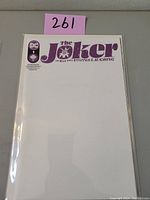 Front view of Joker The Man Who Stopped Laughing #1 blank cover variant comic book sealed in protective plastic showing mostly blank white cover with purple title text and DC logo.