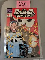 Front cover of The Punisher War Zone #1 comic book showing the title, issue number, and graphic of The Punisher firing a gun with bullets flying.