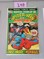 Front cover photo of the Marvel Team-Up #3 comic book displaying Spider-Man, Human Torch, and Morbius with bold comic title and pricing.