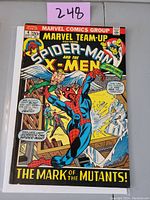 Front cover of Marvel Team-Up #4 comic book with Spider-Man and the X-Men characters in action poses and the title 'The Mark of the Mutants'.