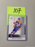 Front view of Wayne Gretzky hockey card in Edmonton Oilers uniform.