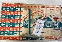 Original box cover featuring Sport Craft branding and vintage style illustration with labeled 'Metal Horseshoe Set'. Box shows signs of wear and staining.