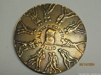 Obverse side showing athletic figures, Olympic rings, and motto "Citius Altius Fortius."