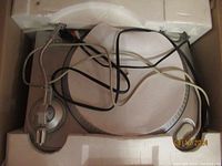 Photo of Ion USB Turntable with tonearm and platter inside original styrofoam packaging in box