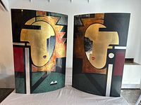 Pair of Angel Rhoads 3D artwork panels depicting abstract female figures with geometric shapes and bold colors.