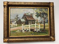 Front view of the framed oil painting depicting a rustic house, white fence, and tree, signed by Elizabeth Harold.