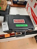 Black plastic carrying case labeled Woodpeckers with green label 'Thickness Gauges'