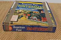Original box labeled American Flyer Frontiersman Electric Train Set with vintage illustrated graphics.