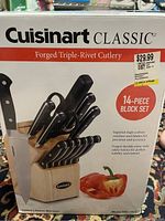 Box of Cuisinart Classic 14-piece cutlery set featuring wooden block and knives with black triple-rivet handles.