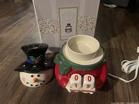 Snowman Scentsy warmer with countdown blocks and box in background