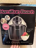 Front of the box showing product name, image, and features including 1.5 quart capacity and no rock salt required.
