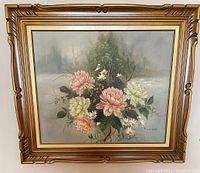 Framed floral painting with pink and white flowers, signed T.C. Chow on lower right.