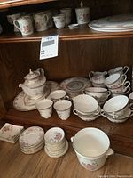 Full view of shelves with all china pieces arranged