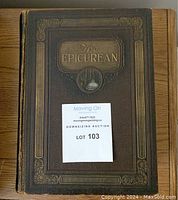 Front cover view showing embossed title and decorative border