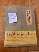 Front and partial cover with title and auction lot sticker visible